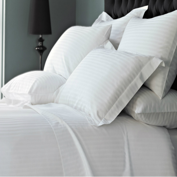 white bed sheets for hotels